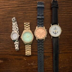 Elegant Watch Collection with Gold and Black Bands